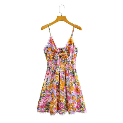 Mini-robe florale trapèze à volants et nœud