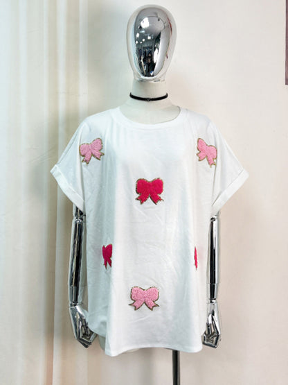 Sparkle T-shirt surdimensionné festif avec nœuds brodés pour femme 